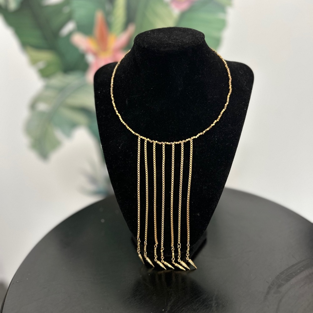 Elegant Gold Necklace with Tassel Design